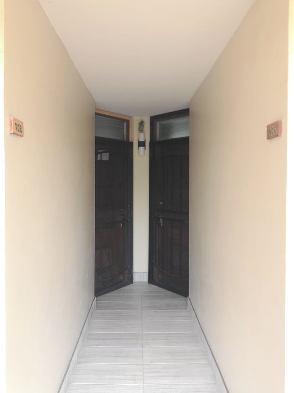 Entrance hallway 207 on the right 