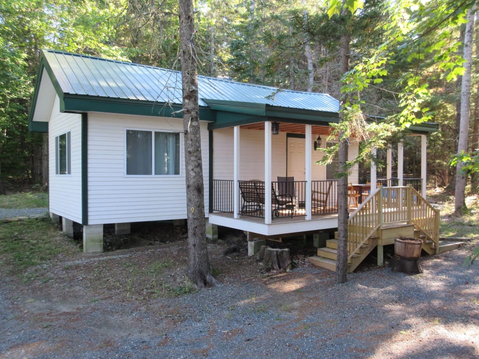 Front of Kerr Cottage showing porch and  parking area