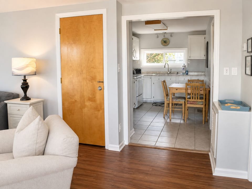 From the front entry - bedroom 1 to the right, living to the left. Kitchen ahead
