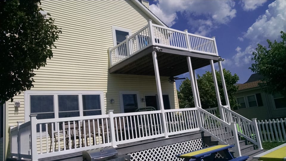 2 decks facing bay from back of the house - upper deck is off the main bedroom