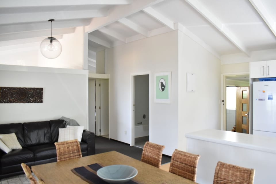 Dining looking to bathroom and bedrooms