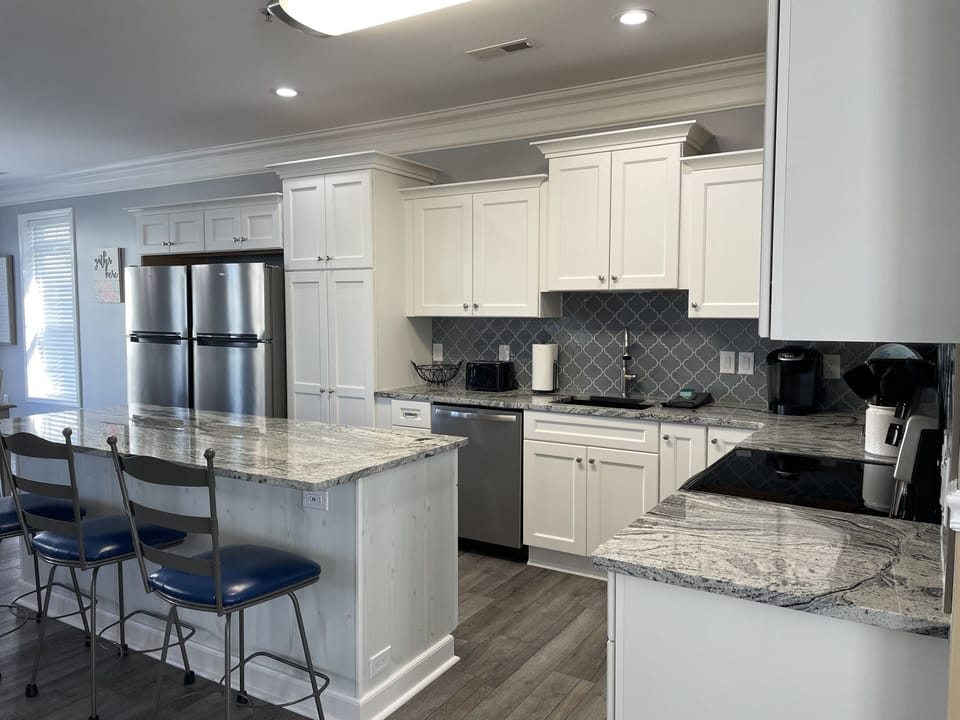 Well-equipped and sizeable kitchen can accommodate multiple cooks