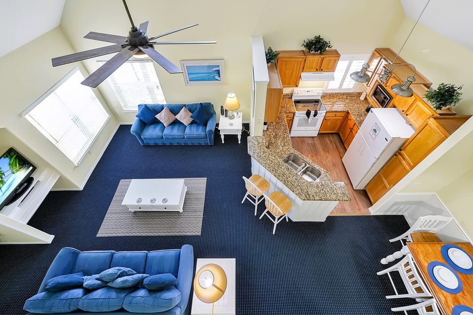 Open and airy -- Cathedral ceilings with ceiling fan . New! 65" Roku TV added