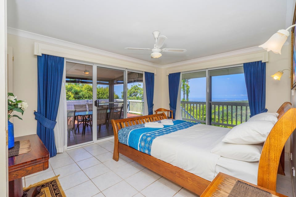 Wake up in the clouds. Panoramic ocean and sunrise views from your pillow