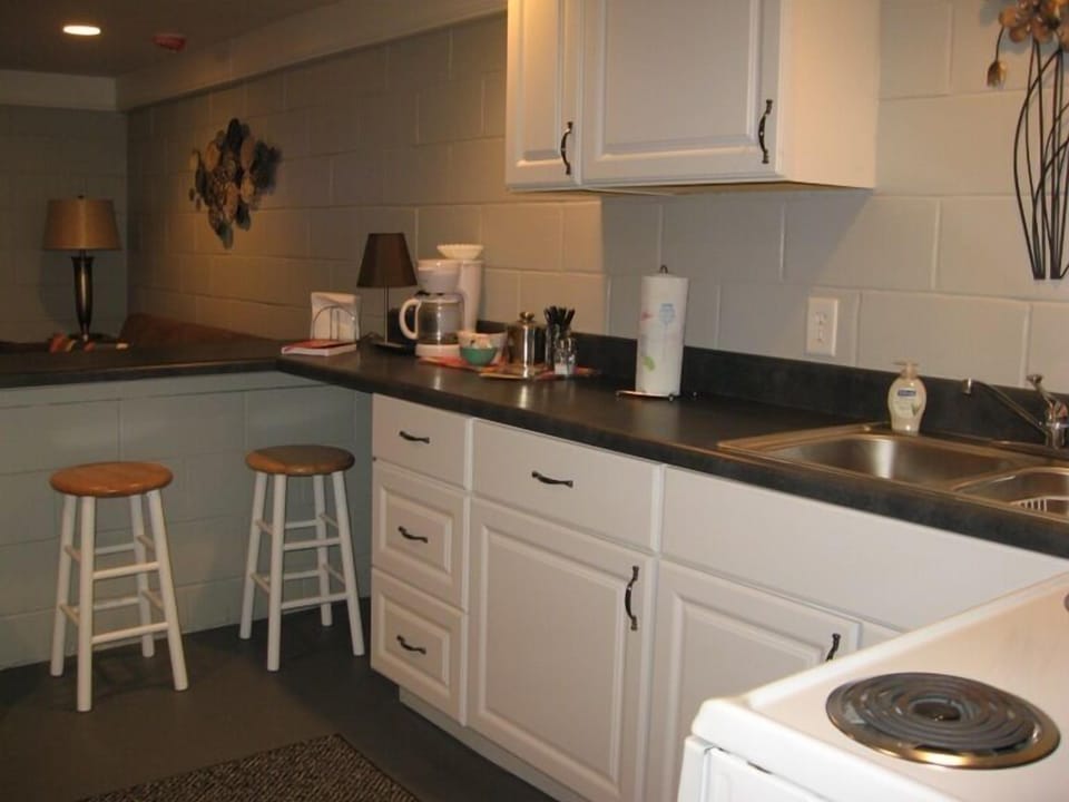 Kitchen is fully equipped, including a coffee bar for your convenience.