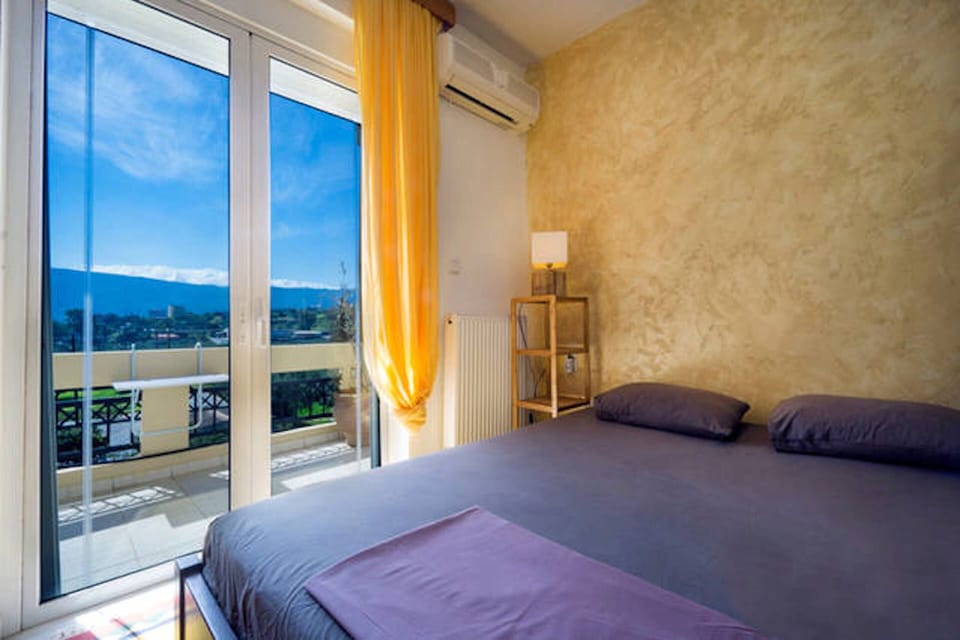 master bedroom with private balcony with unlimited sea and mountain view