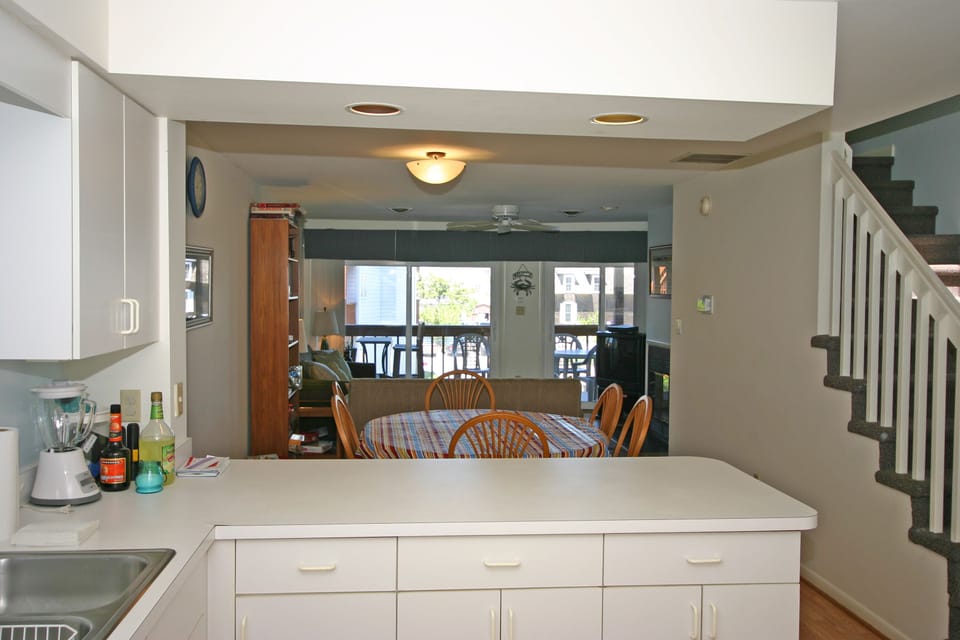 Kitchen looking to dining and living rooms.