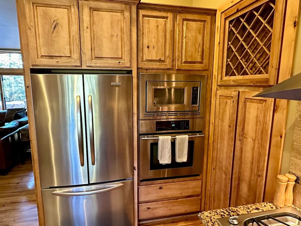Kitchen Aid Refrigerator and Jenn Air oven and microwave
