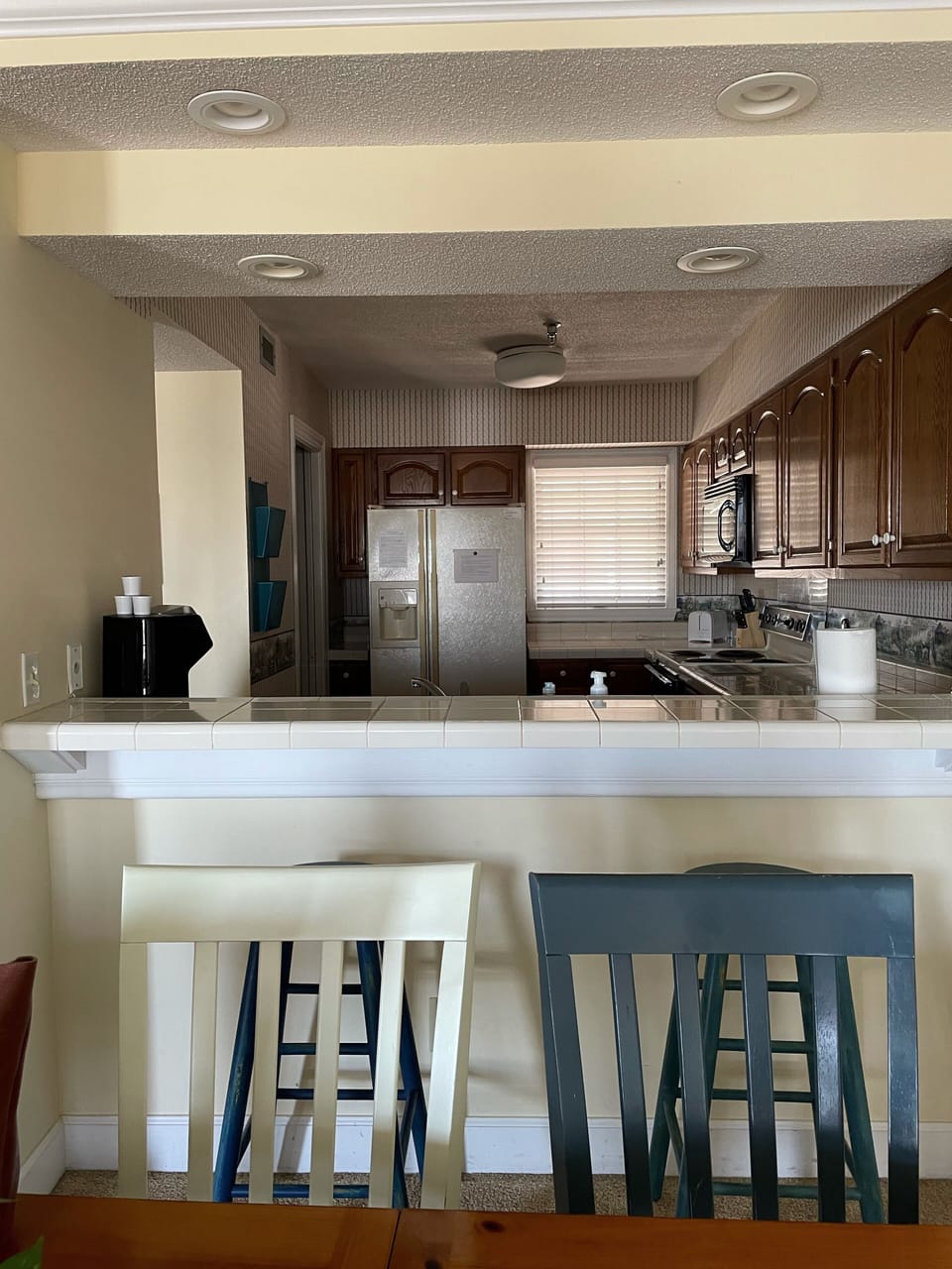 Looking into the kitchen from the dining area. 