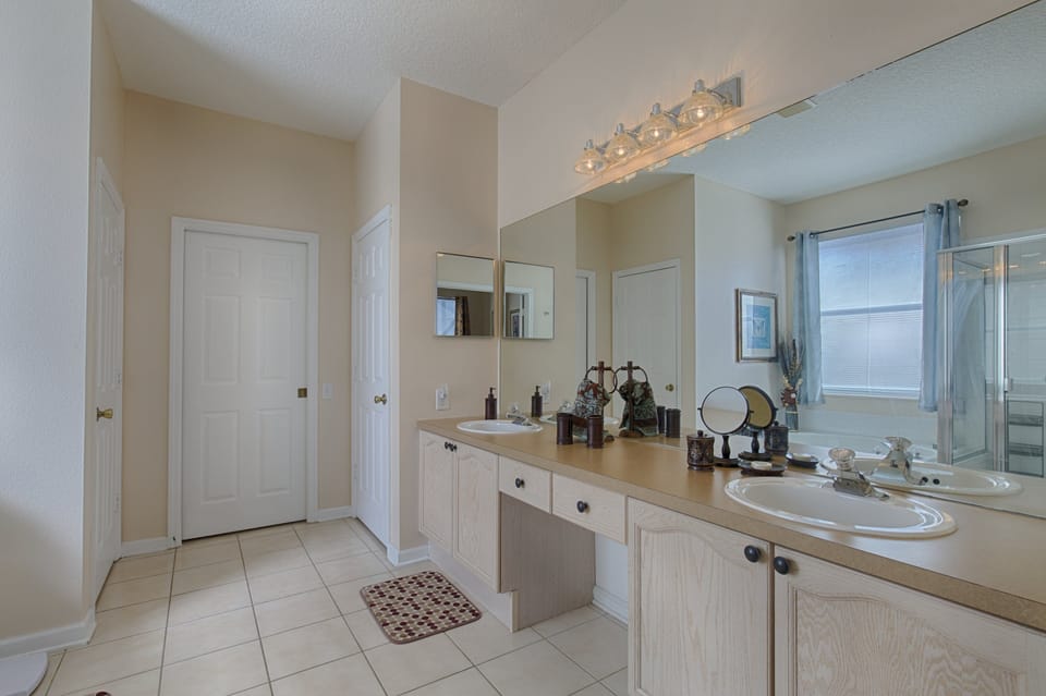 Master Bath with Dual Sinks and Large Walk In Closet