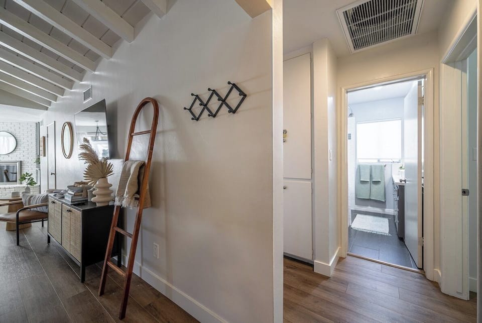 Hallway to bedrooms and bathrooms