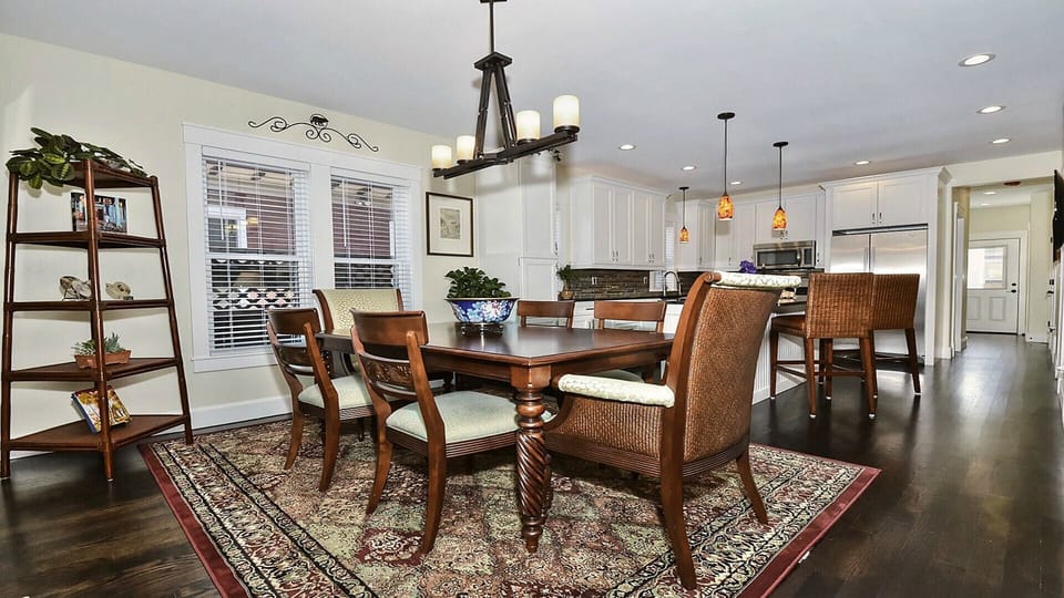 Dining room opens to kitchen for entertaining while cooking