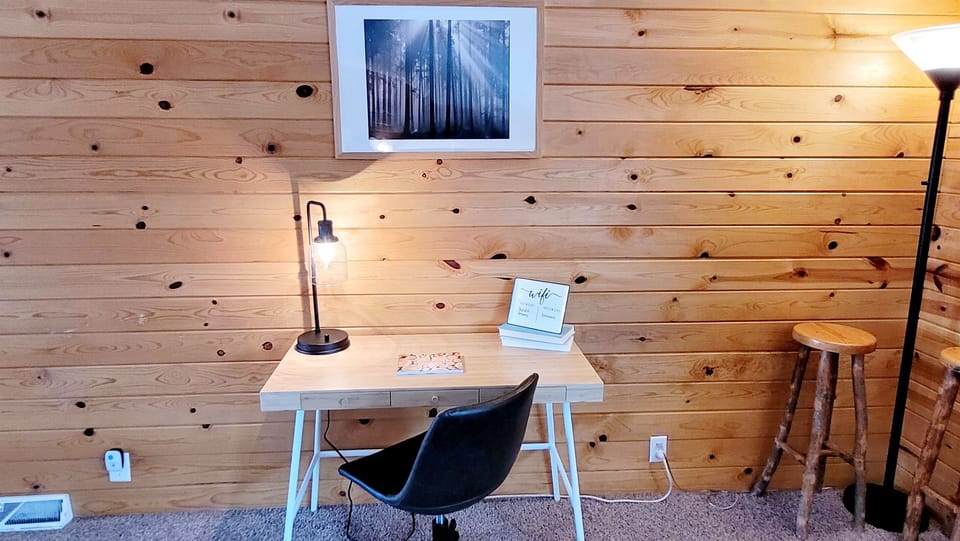 We offer a little work station in case working from home means working from the cabin.
