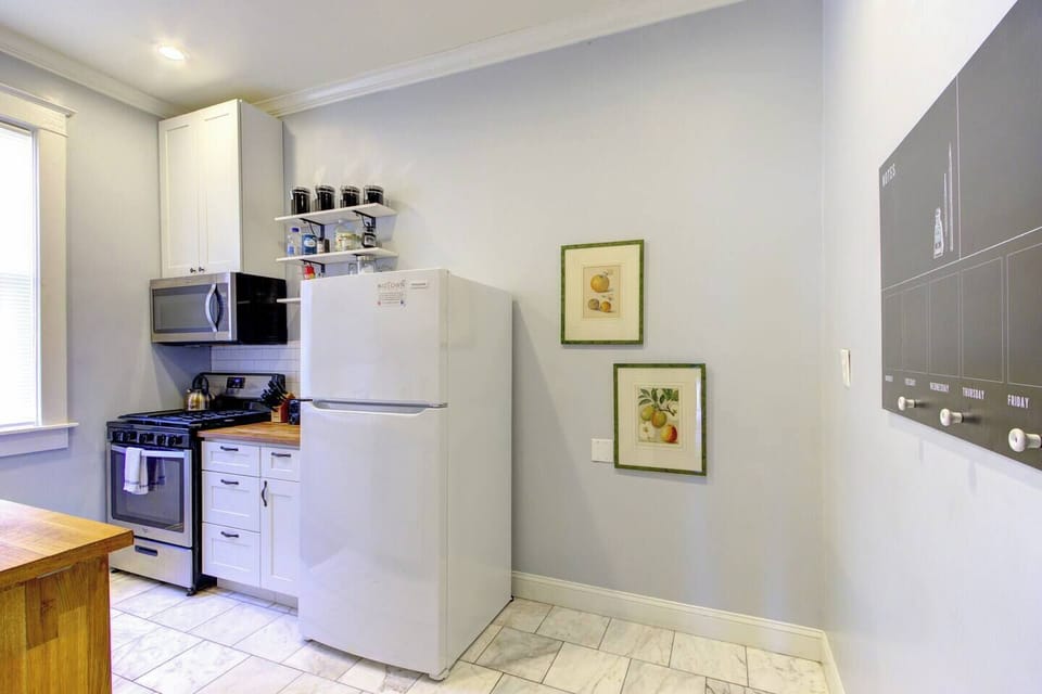 All modern appliances and full size fridge.