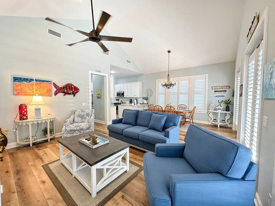 Spacious, light-filled, and made for connection — with a seamless view from the living room to the dining table and chef’s kitchen.