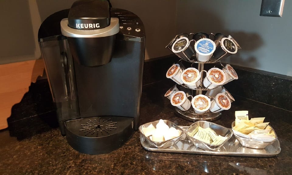 Coffee provided with creamers and sweeteners 