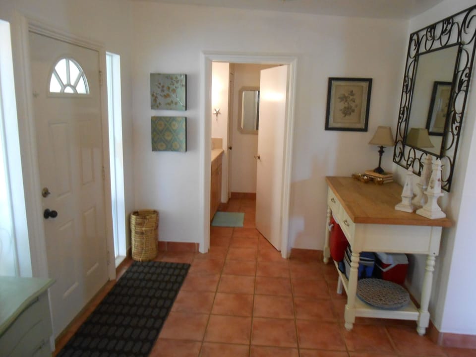 Front door foyer into bath