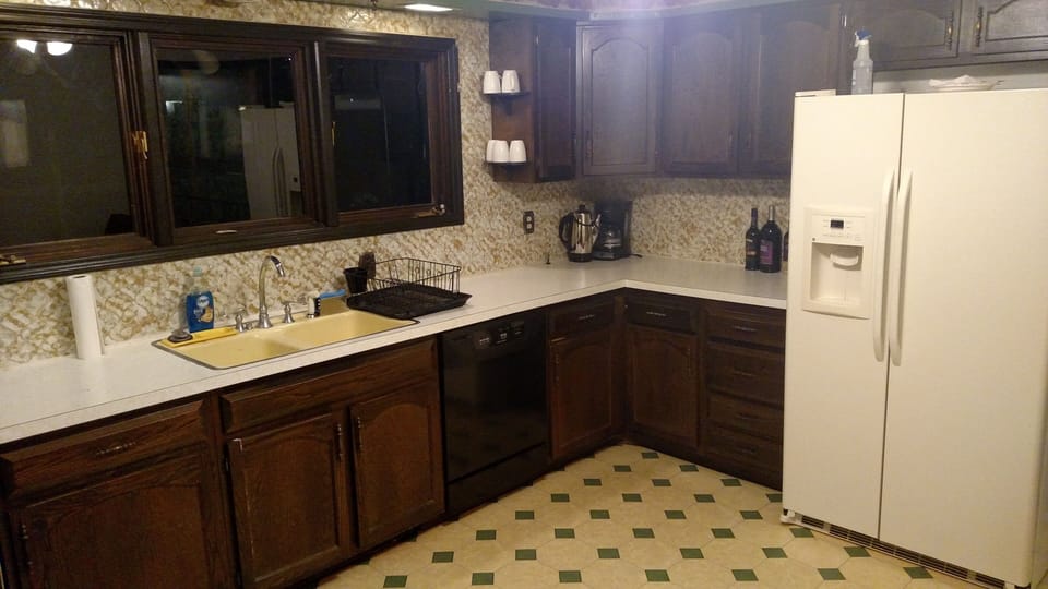 Kitchen with refrigerator (extra refrigerator in the garage)