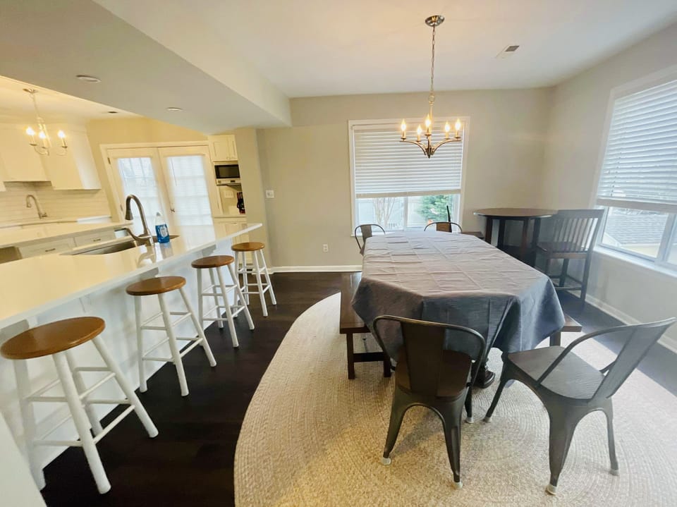 Enjoy dinner as a family at the large dining table 