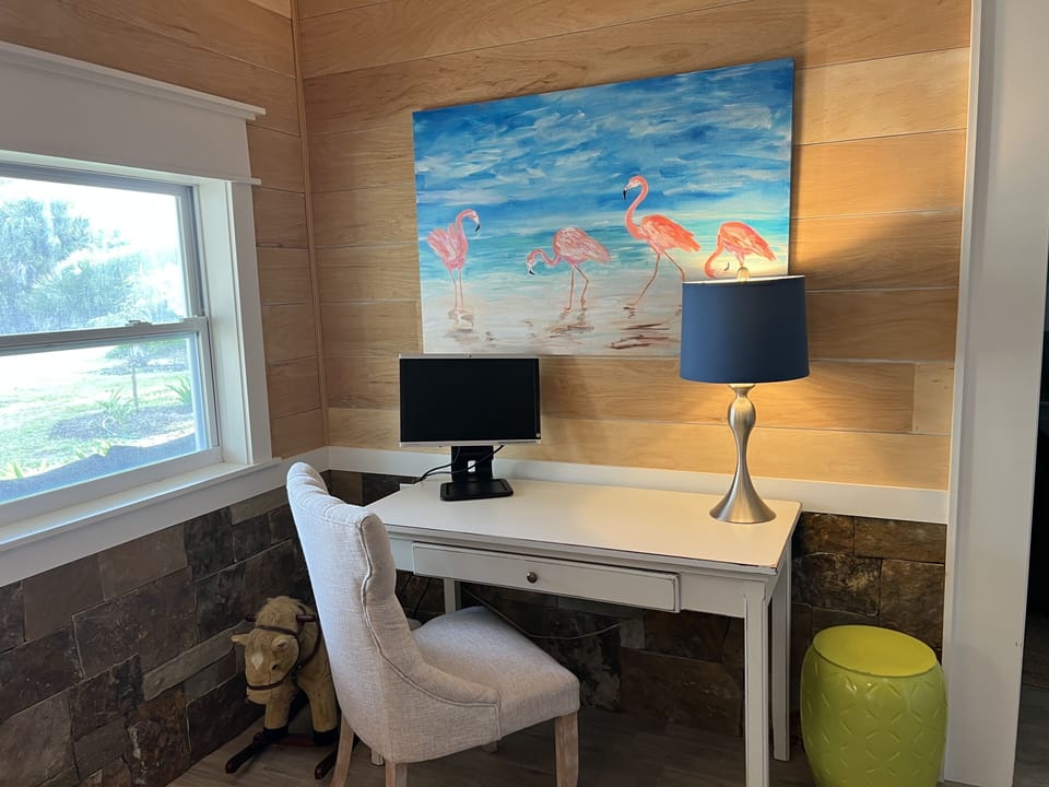 If work beckons, we have a desk and provide a second monitor for you to use.