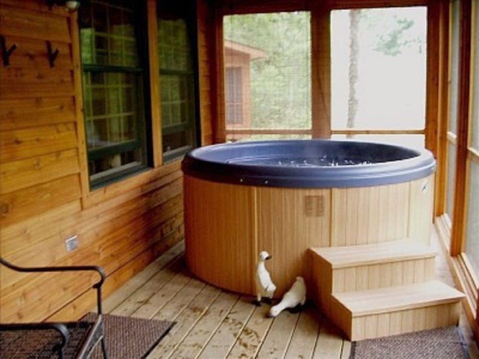 Private hot tub on the screened porch