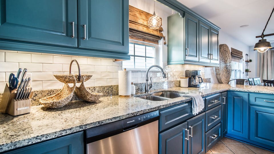Brand new remodeled kitchen, with new tile backsplash, appliances and lighting