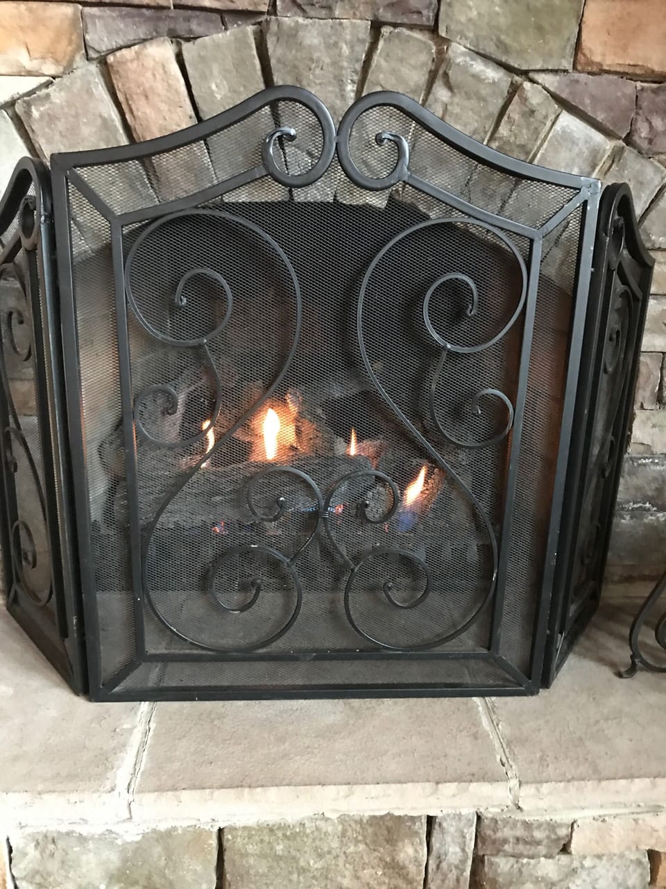 Open faced, unvented, propane fire place