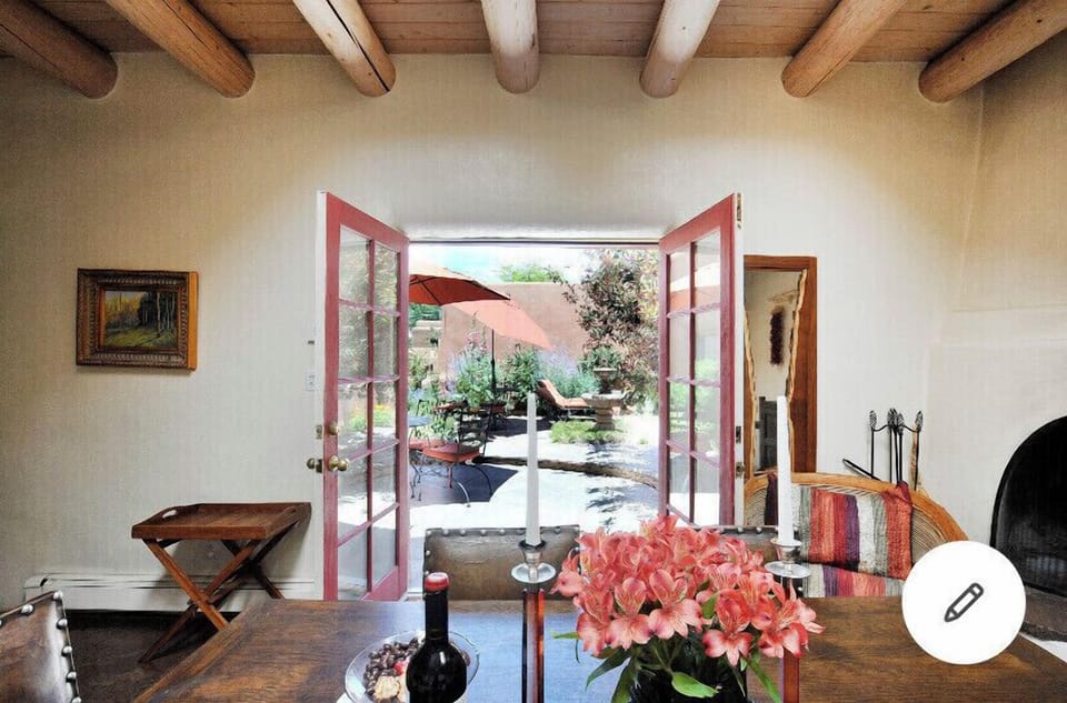 Outdoor/indoor living open to Private Patio With BBQ, dining and relax Area