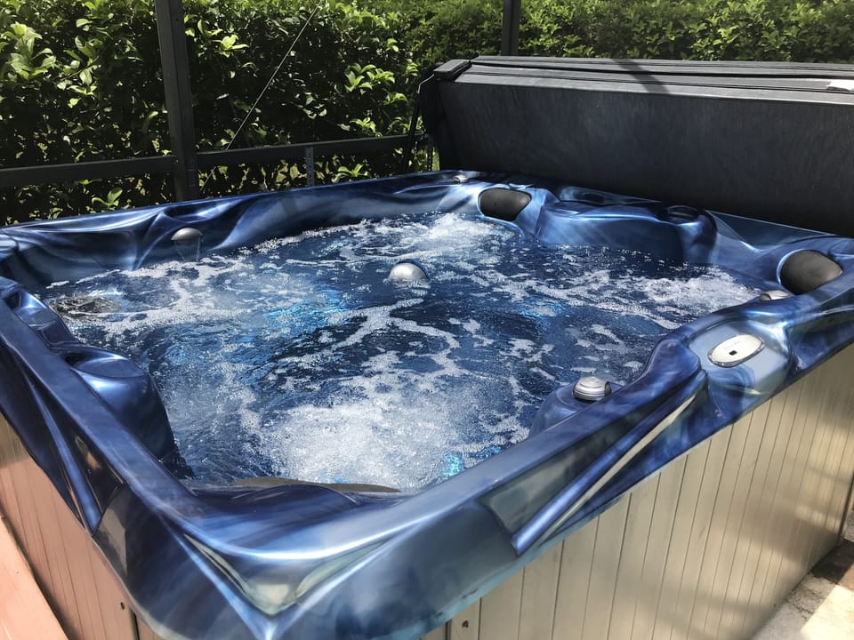 The hot tub is amazing after a day at the parks!  Leave top off to cool it down.