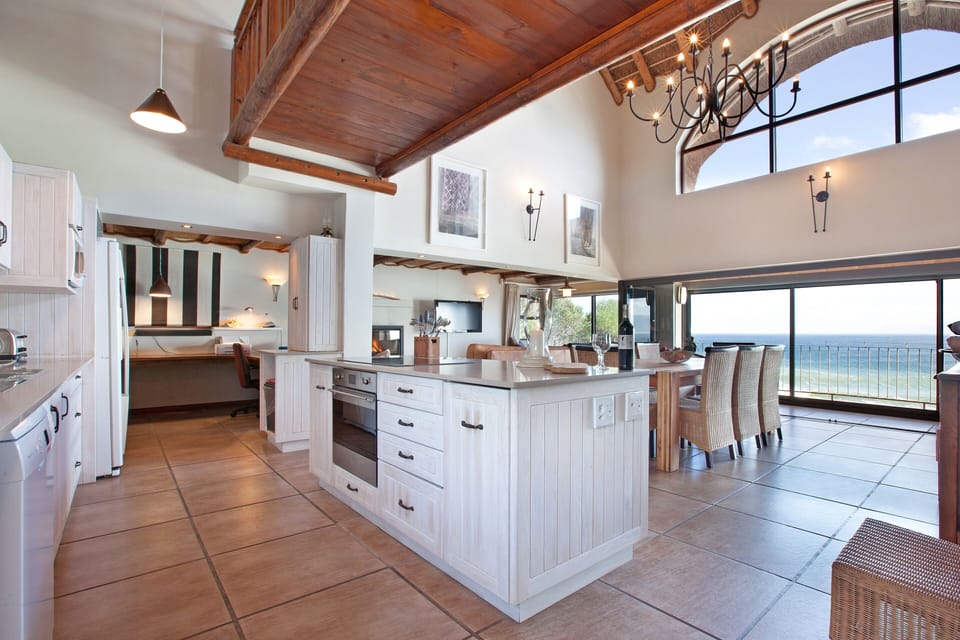 Gourmet kitchen with high-end appliances and great views
