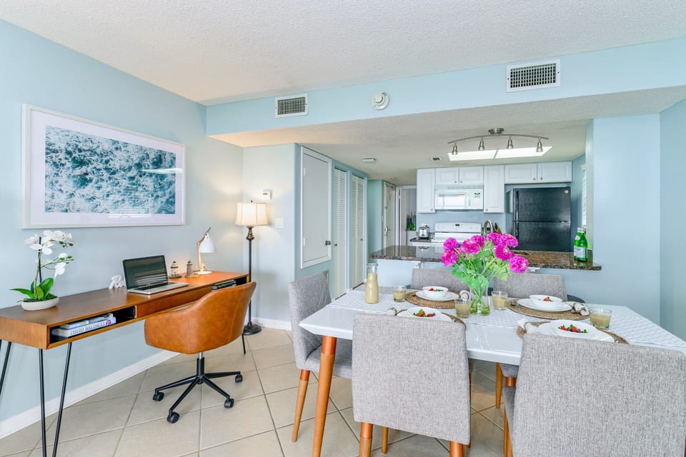 Stylish dining area adjacent to the kitchen, offering a welcoming space for meals and gatherings.