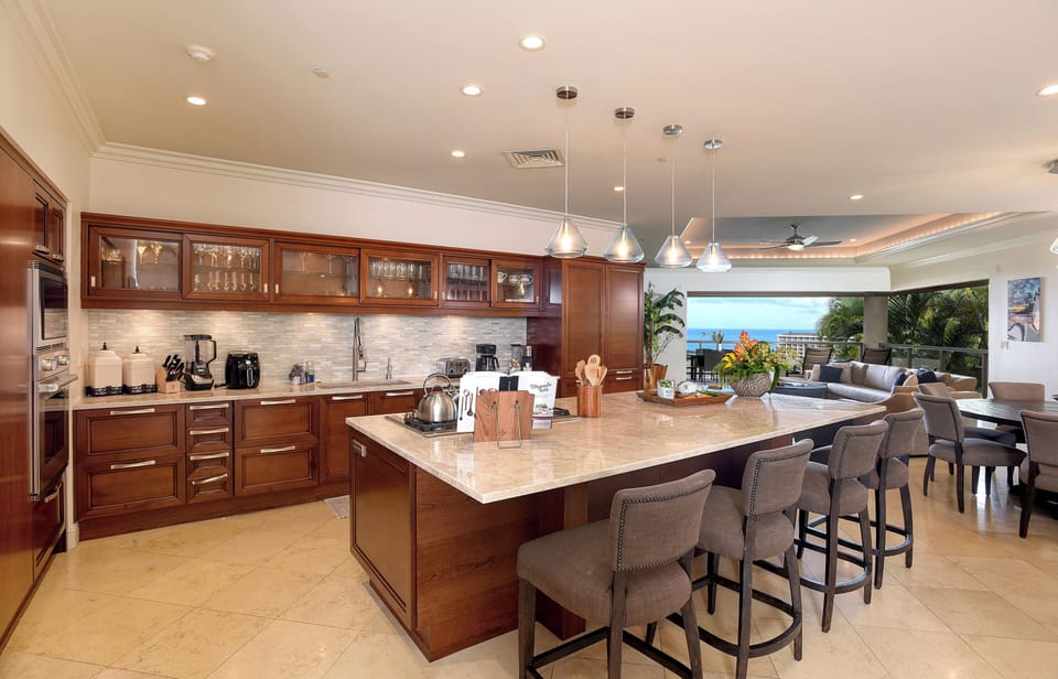 Ocean View from the Kitchen through the Living Room. Newly renovated 2024. New countertop and appliances. ( 23-1 Ho’olei, Maui, Wailea, Hawaii )