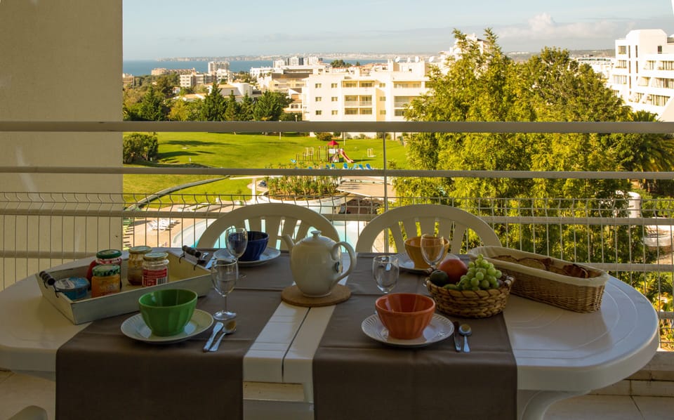Breakfast view on pool and Lagos Bay