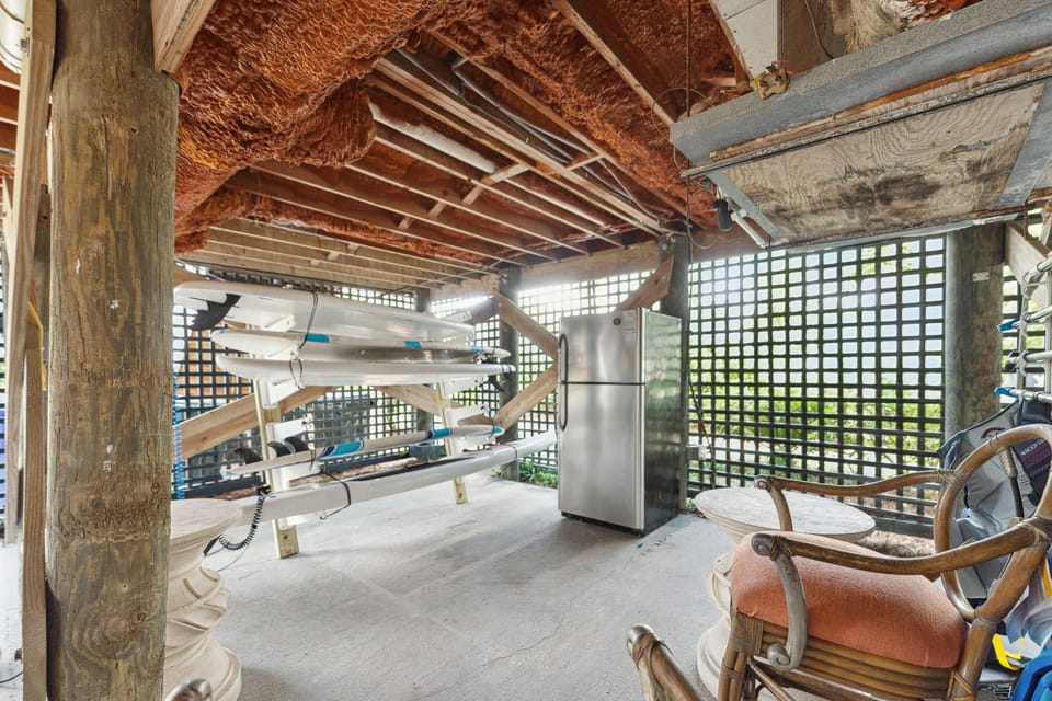 Fridge for easy access if using the pool and stand up paddle boards 