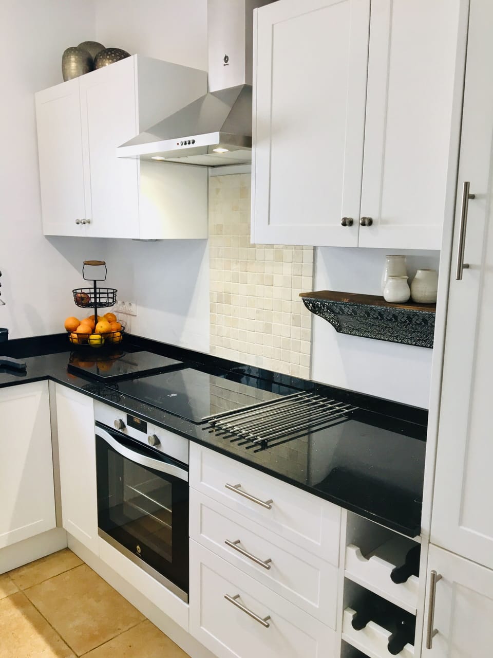 Updated well stocked kitchen with granite worktops 