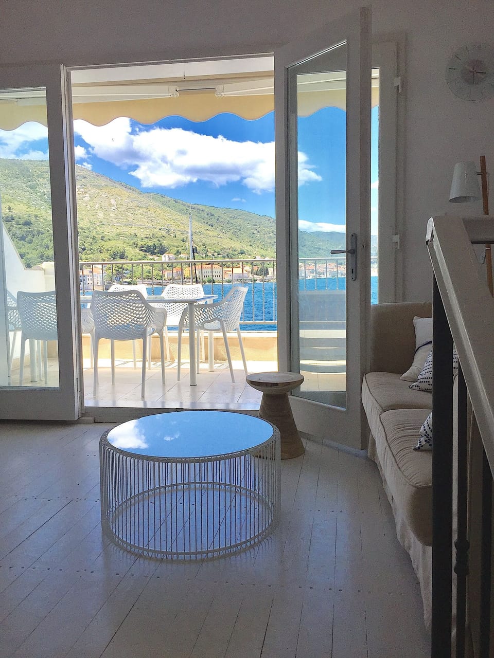Upstairs living room, looking out over terrace at the stunning Vis harbour