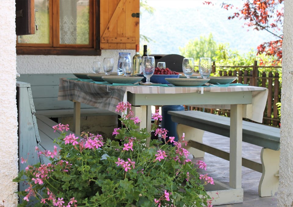Panoramic mountain views from the outdoor dining area.