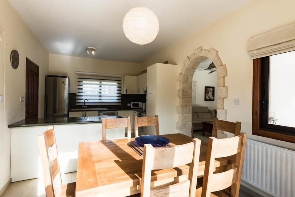 The Dining Room has a solid oak extendable table