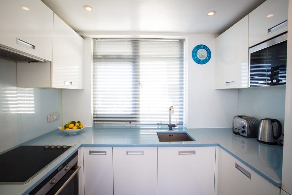 Beautiful bespoke Italian blue granite kitchen with views towards the Downs