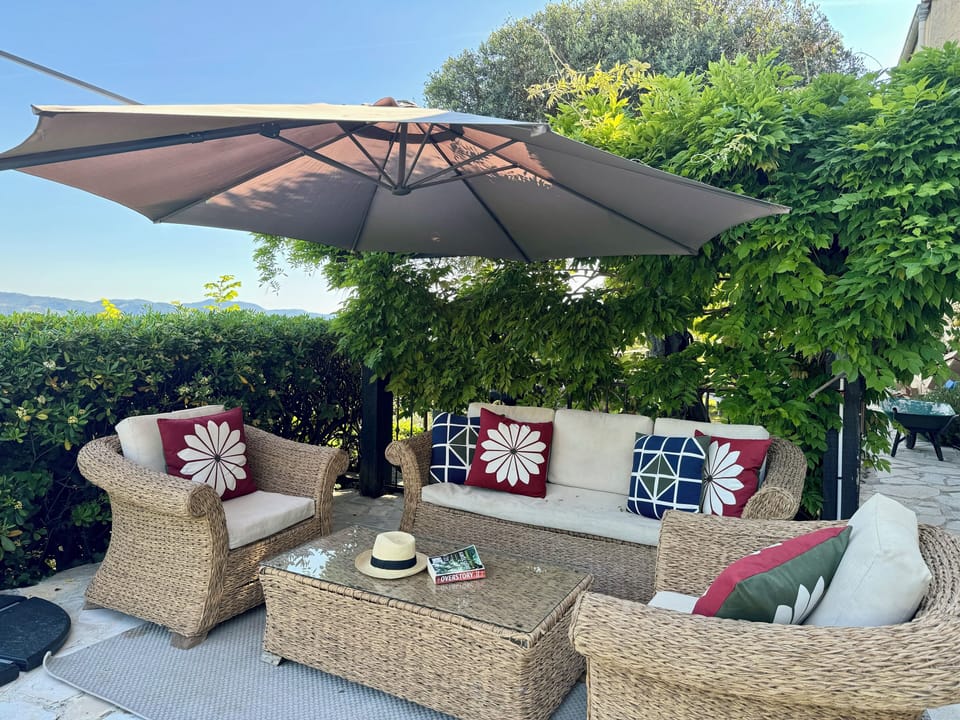 Relax by the pool with view to the hills and local village