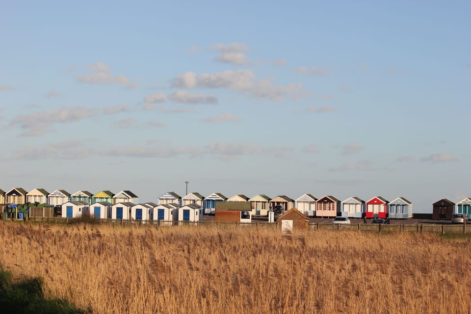View of the beach huts from the marshes