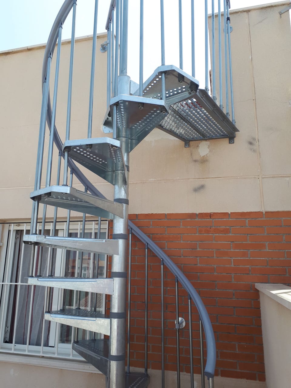 Spiral stairs to the sunbeds