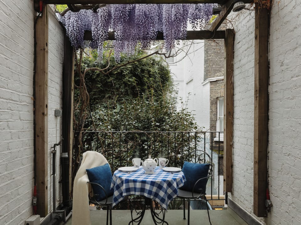 Sun-trap terrace accessed from the kitchen