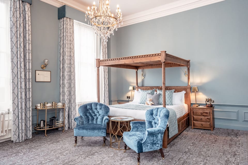 Luxury Suite | Premium bedding, desk, laptop workspace, blackout drapes
