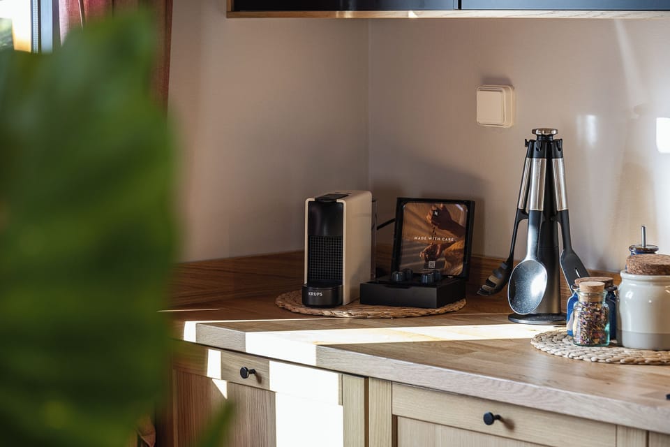 A fully equipped kitchen with Nespresso coffee machine