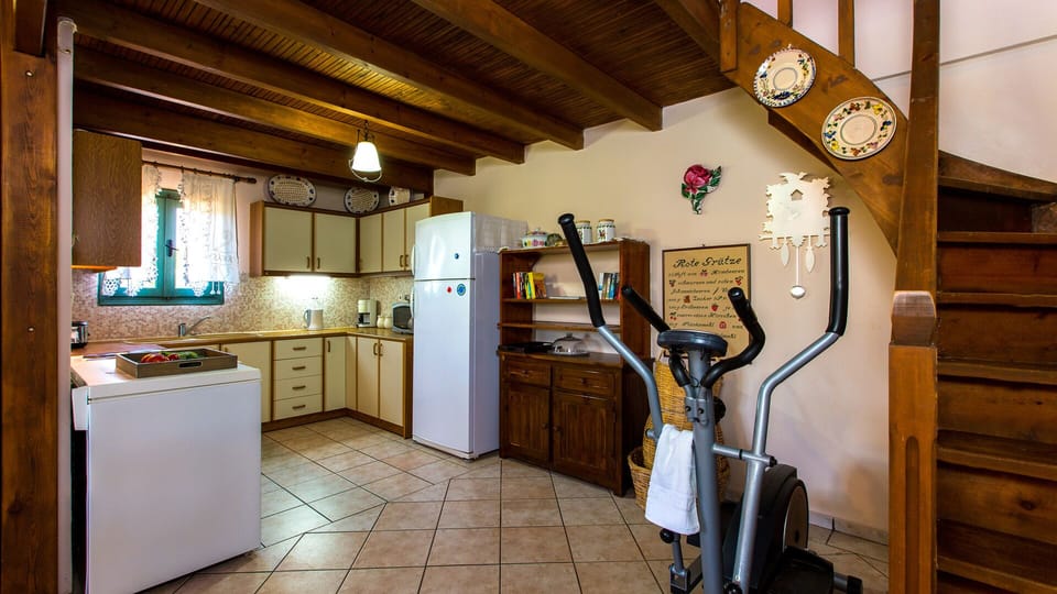 Fully equipped kitchen and elliptical machine