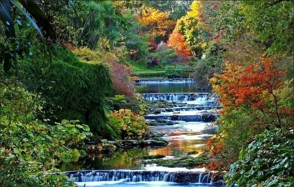River Vatry passing through Mount Usher Gardens in the village
