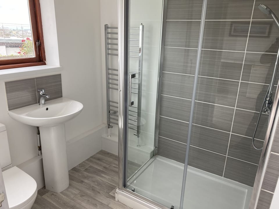 Downstairs shower bathroom next to The Boat House Room