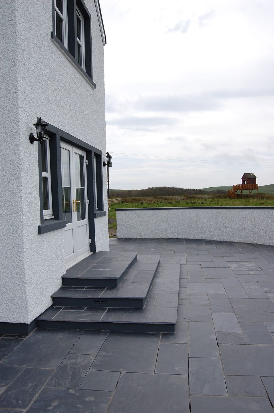 paved patio area at front
