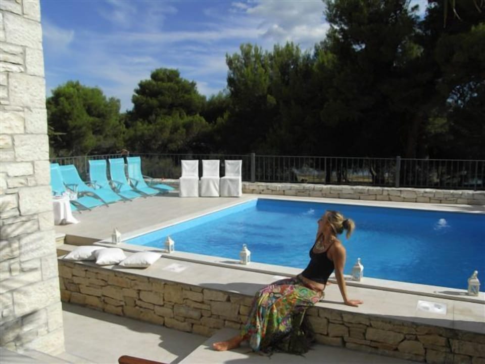 Pool and sun terrace south facing overlooks sea and nature reserve.